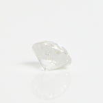 Icy white round brilliant-cut rustic diamond.