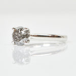 Platinum salt and pepper round brilliant cut diamond engagement solitaire ring