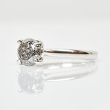 Platinum salt and pepper round brilliant cut diamond engagement solitaire ring