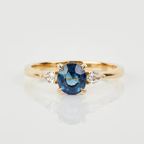 18ct yellow gold oval trilogy ​teal sapphire rings