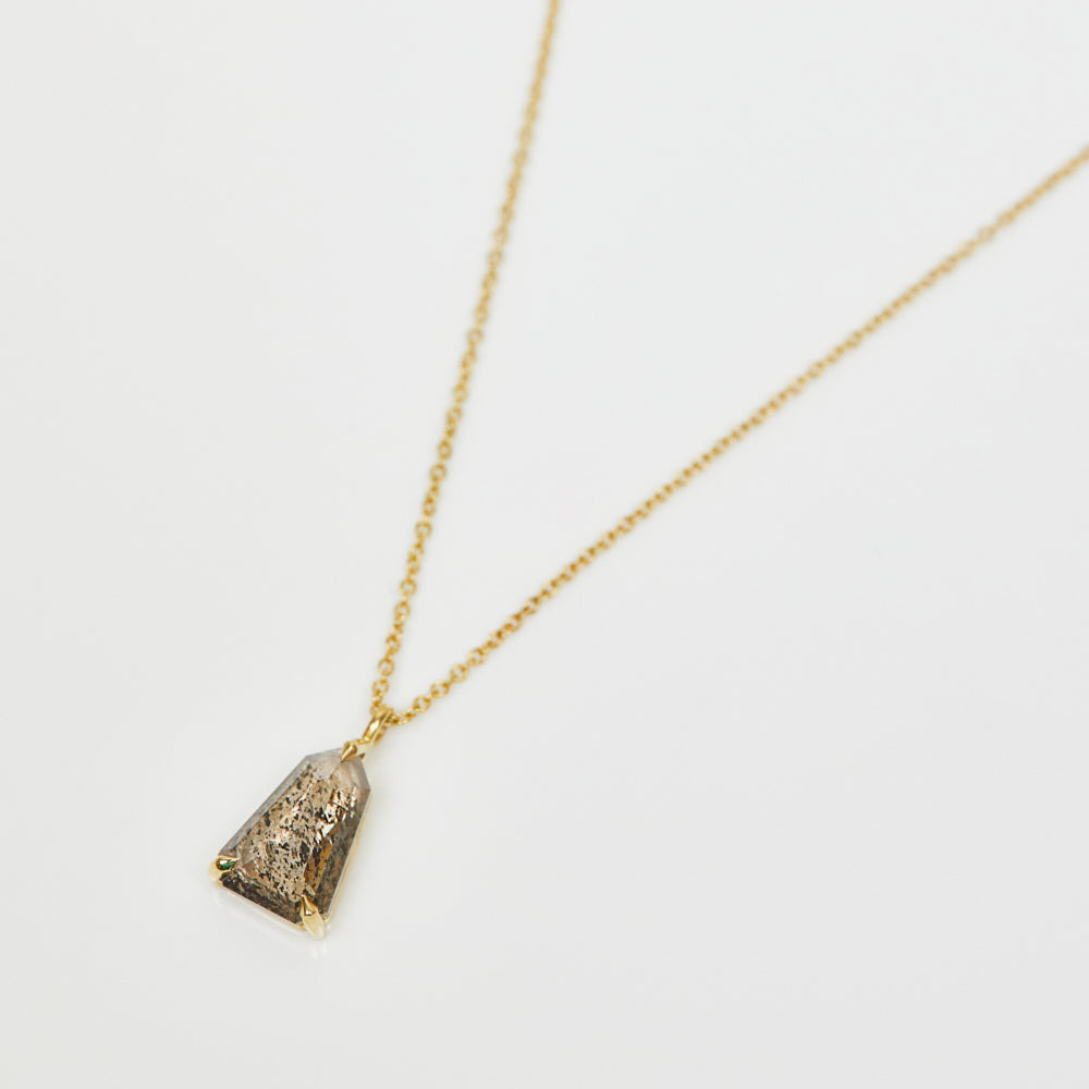 Shield-shaped salt and pepper diamond necklace in 18ct yellow gold.