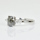 Platinum salt and pepper oval diamond engagement trilogy ring