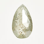 Handcrafted elongated pear-shaped rose-cut light grey salt and pepper diamond.
