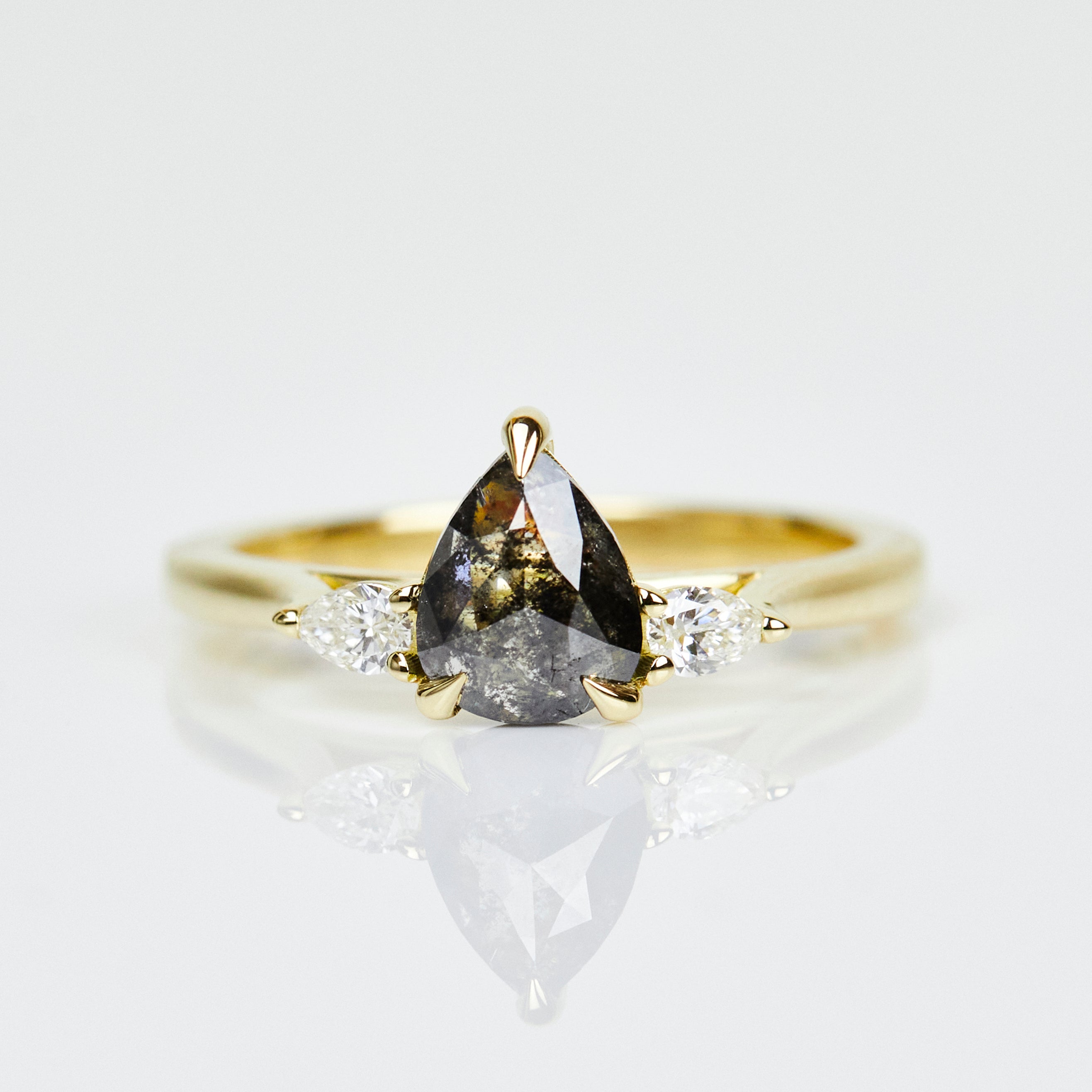 18ct yellow gold salt and pepper pear diamond engagement trilogy ring