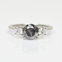 Platinum salt and pepper round brilliant cut diamond engagement trilogy ring