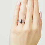 Platinum salt and pepper hexagon diamond engagement pavé ring