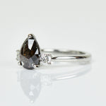 Platinum salt and pepper pear diamond engagement trilogy ring