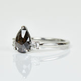 Platinum salt and pepper pear diamond engagement trilogy ring