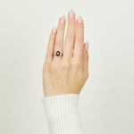 Platinum salt and pepper pear diamond engagement trilogy ring