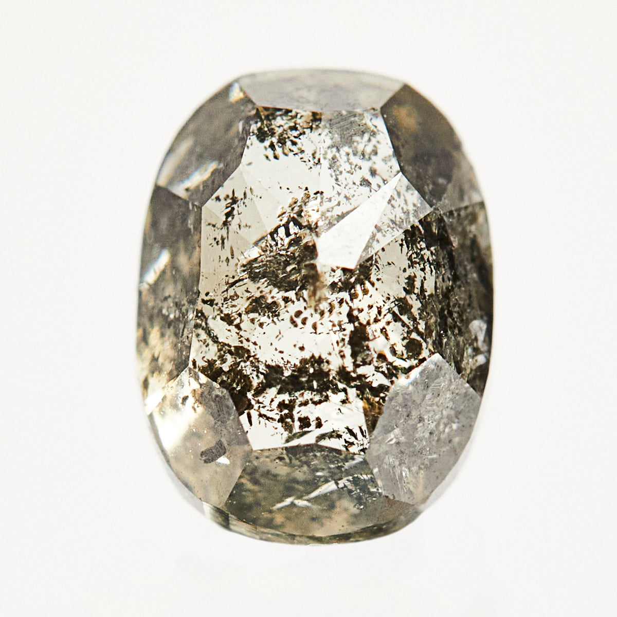 One-of-a-kind oval rose-cut rustic salt and pepper diamond.