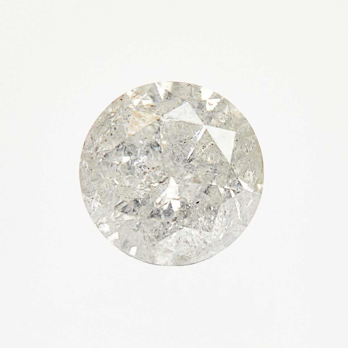 Timeless round brilliant-cut icy white ethically sourced salt and pepper diamond.