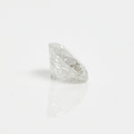 Timeless round brilliant-cut icy white ethically sourced salt and pepper diamond.