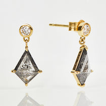 Kite-shaped salt and pepper diamonds with round diamonds in 18ct yellow gold.