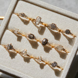 18ct yellow gold salt and pepper oval diamond engagement trilogy ring