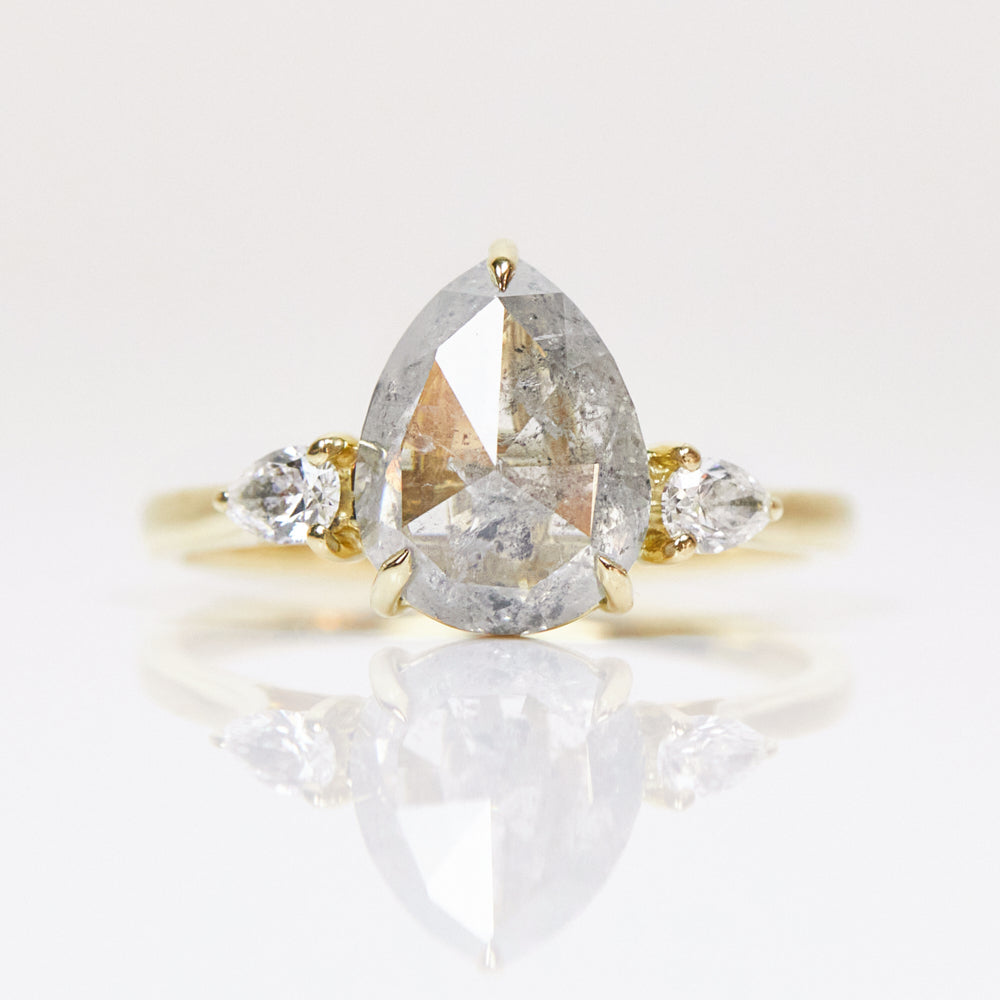 18ct yellow gold salt and pepper pear diamond engagement trilogy ring