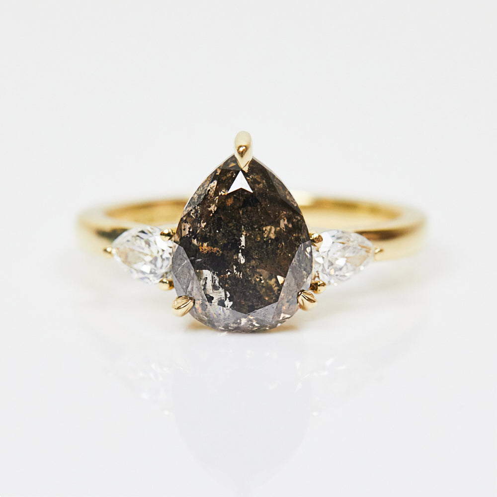 18ct yellow gold salt and pepper pear diamond engagement trilogy ring