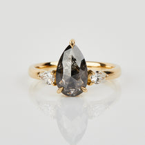 18ct yellow gold salt and pepper pear diamond engagement trilogy ring
