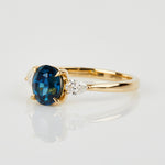 18ct yellow gold oval trilogy ​teal sapphire rings