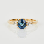 18ct yellow gold oval trilogy ​teal sapphire rings