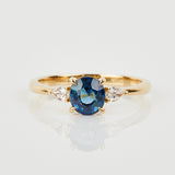18ct yellow gold oval trilogy ​teal sapphire rings