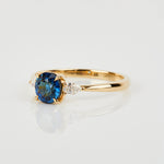 18ct yellow gold oval trilogy ​teal sapphire rings