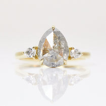 18ct yellow gold salt and pepper pear diamond engagement trilogy ring