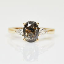 18ct yellow gold salt and pepper oval diamond engagement trilogy ring