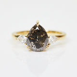 18ct yellow gold salt and pepper pear diamond engagement trilogy ring