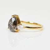 18ct yellow gold salt and pepper pear diamond engagement trilogy ring
