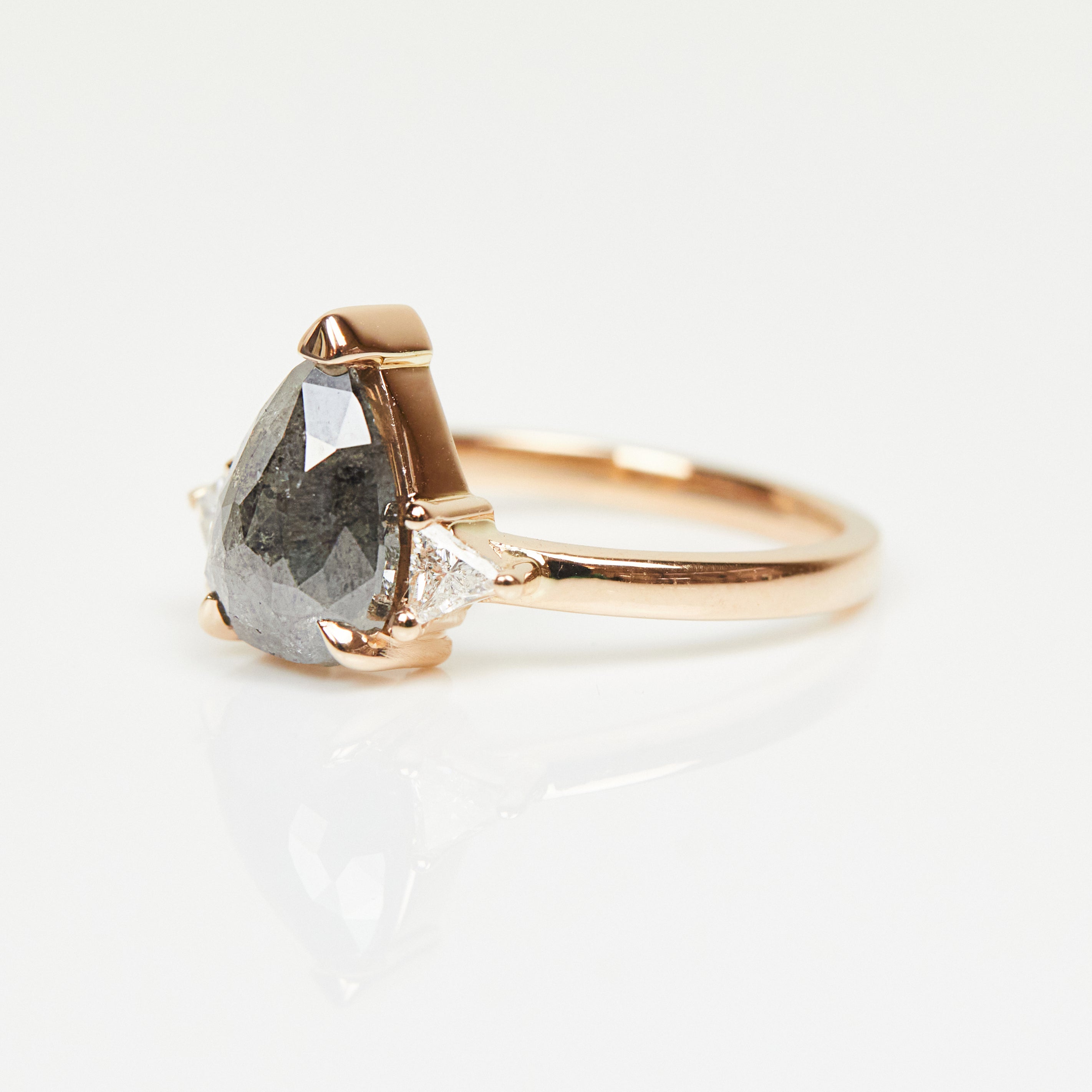 18ct rose gold salt and pepper pear diamond engagement trilogy ring