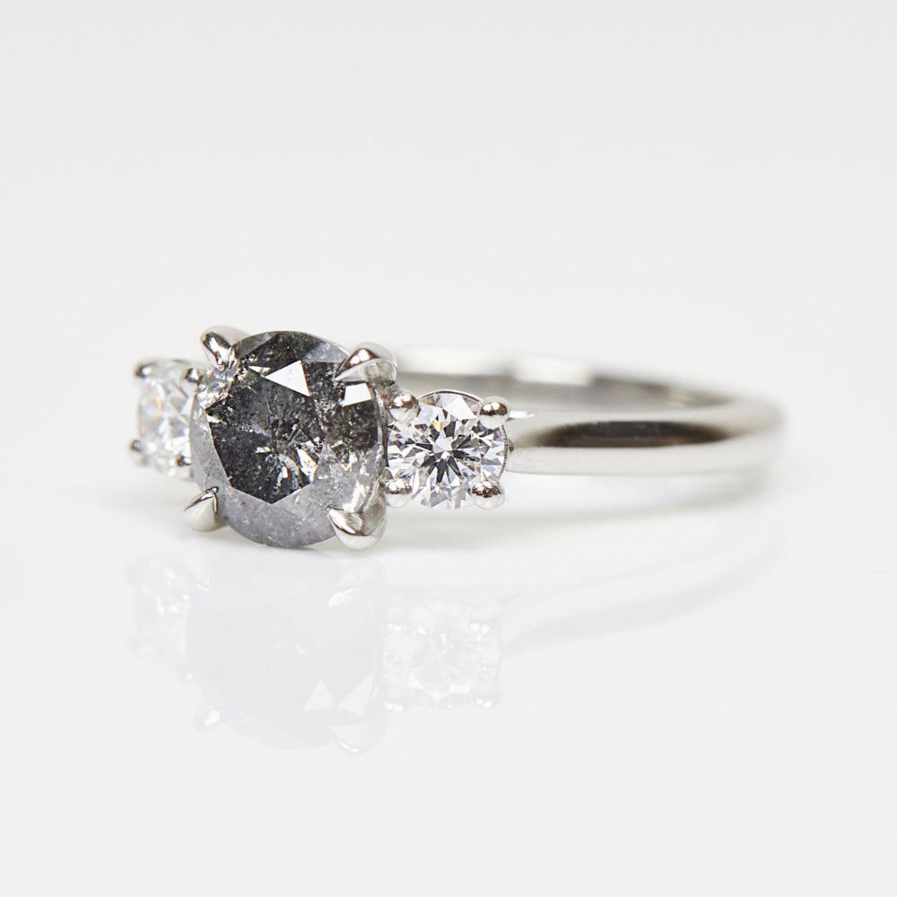 Platinum salt and pepper round brilliant cut diamond engagement trilogy ring