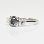 Platinum salt and pepper round brilliant cut diamond engagement trilogy ring