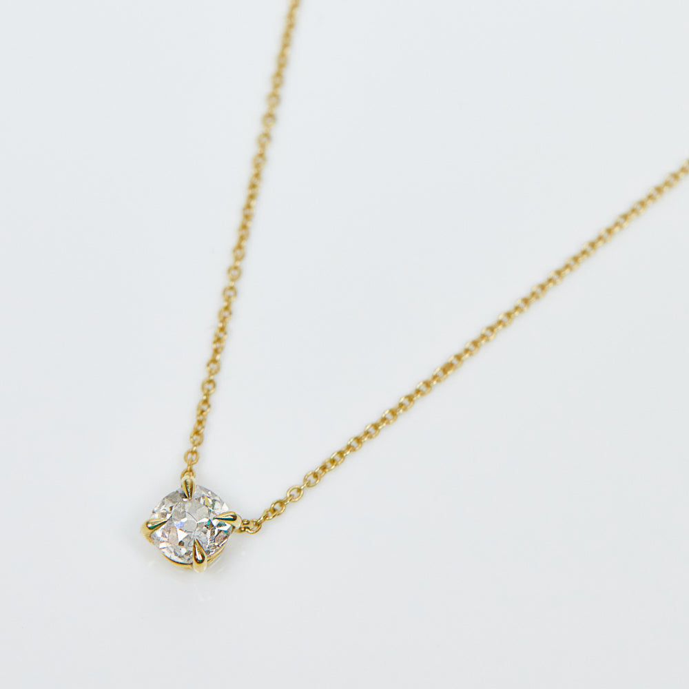 Round brilliant cut salt and pepper diamond necklace in 18ct yellow gold.