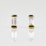 White baguette-cut lab-grown diamond earrings set in 18ct yellow gold.