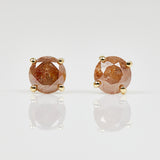 1ct round brilliant cut burnt orange diamonds set in 18ct yellow gold stud earrings.