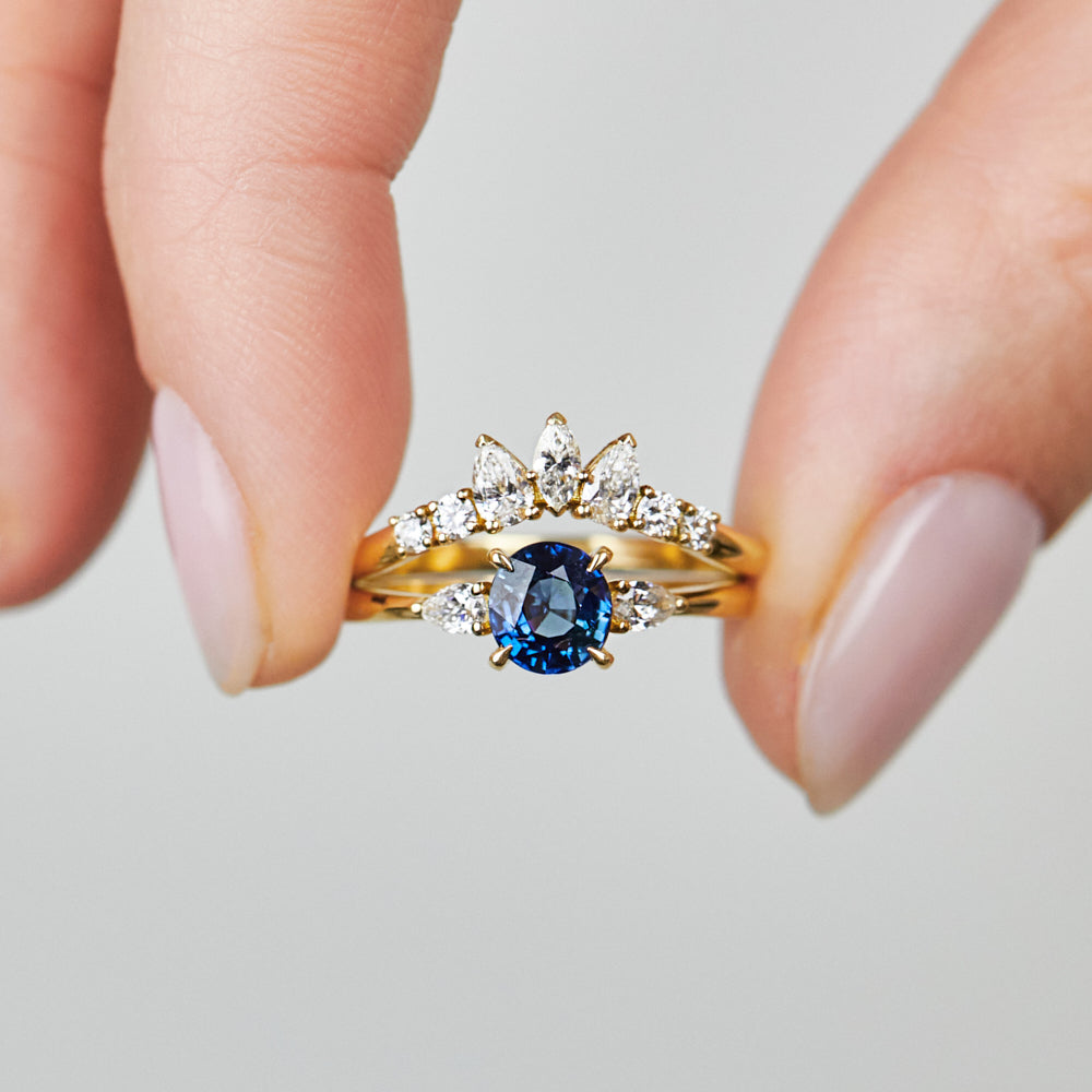 18ct yellow gold oval trilogy ​teal sapphire rings