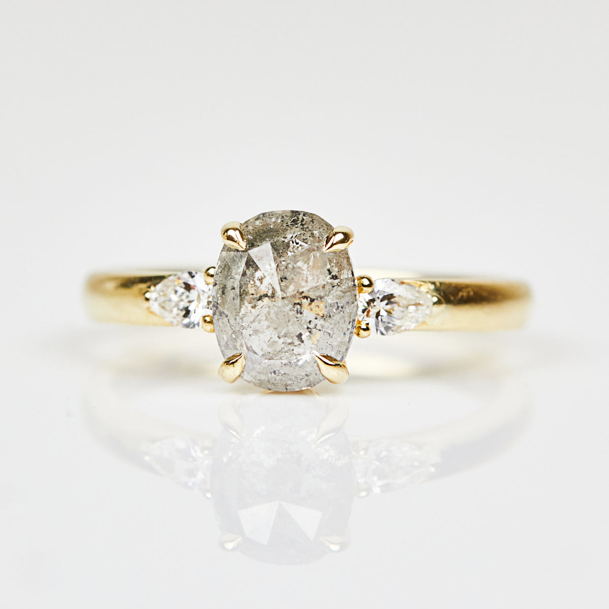 18ct yellow gold salt and pepper oval diamond engagement trilogy ring