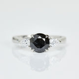 Platinum salt and pepper round brilliant cut diamond engagement trilogy ring