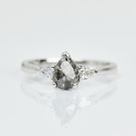 Platinum salt and pepper pear diamond engagement trilogy ring