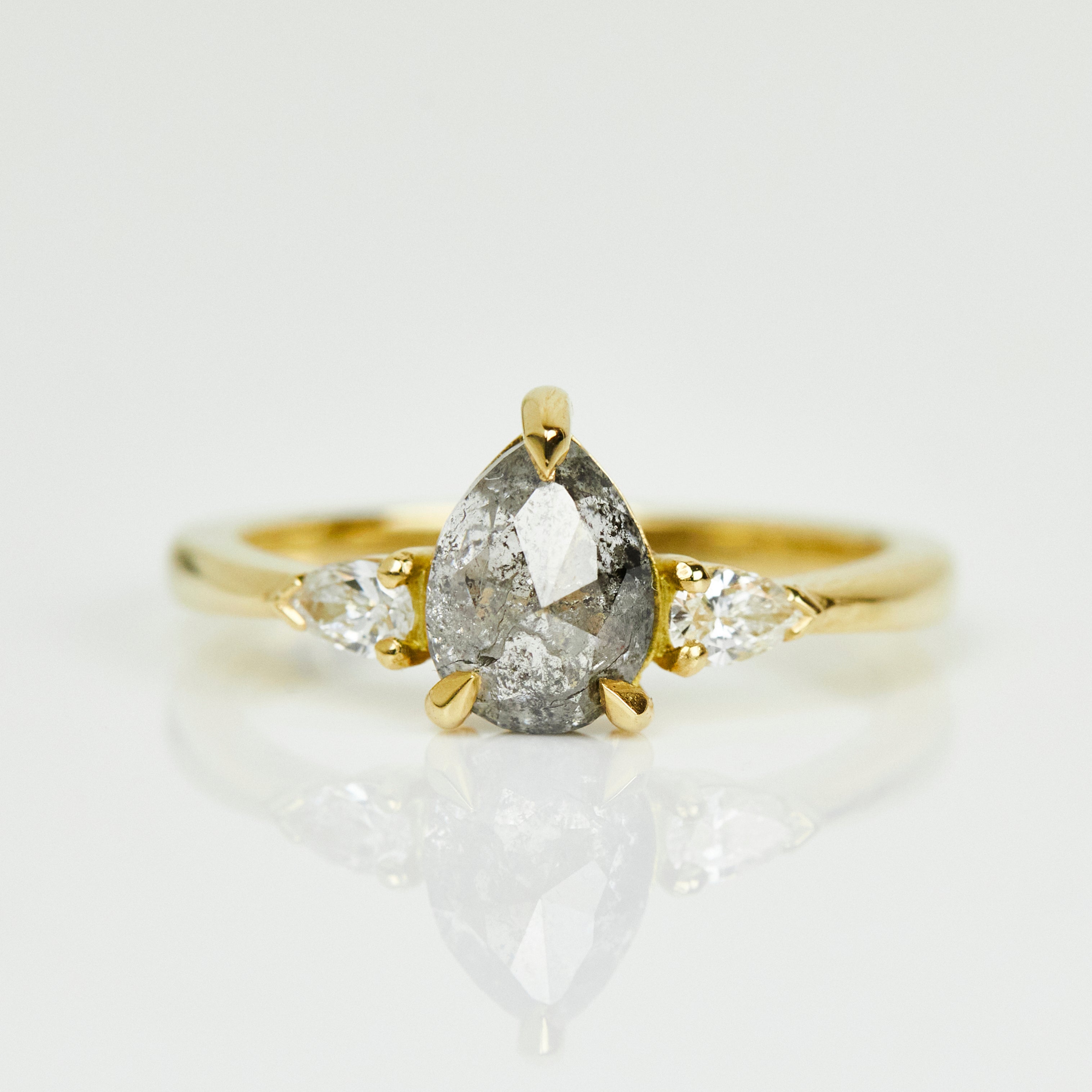 18ct yellow gold salt and pepper pear diamond engagement trilogy ring