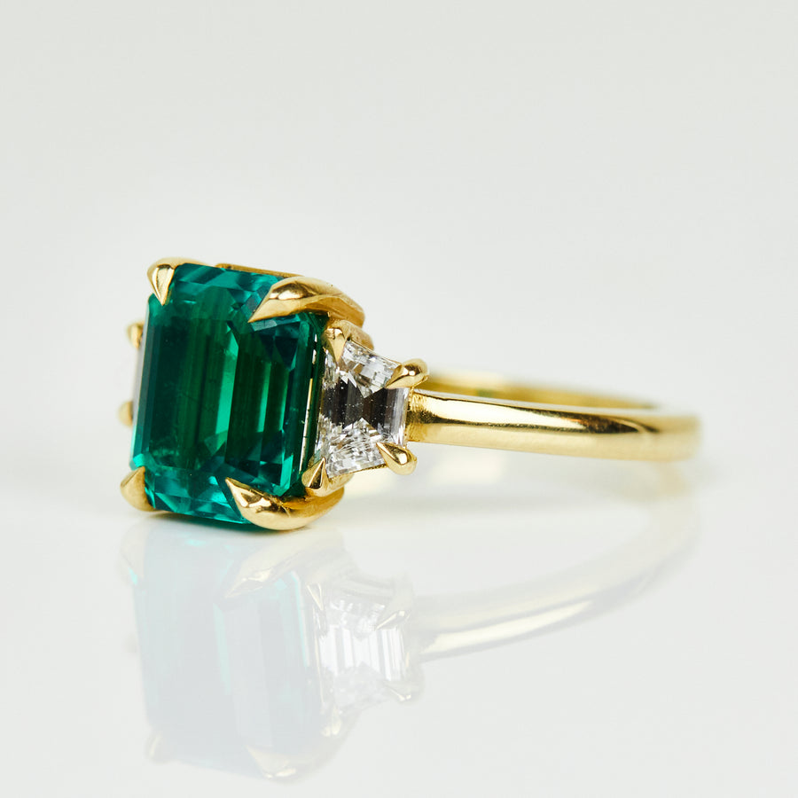 lab grown green emerald engagement ring 