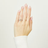 Platinum salt and pepper oval diamond engagement trilogy ring