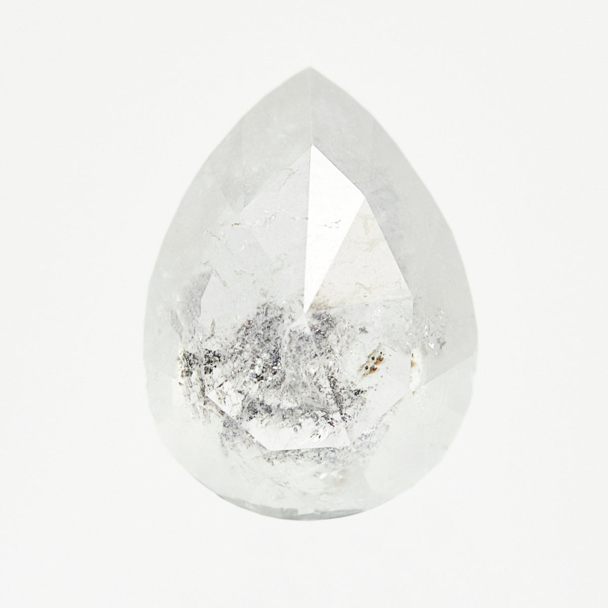 One-of-a-kind pear-shaped rose-cut icy white diamond with unique inclusions.