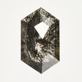 Elongated hexagon rose-cut black salt and pepper diamond.