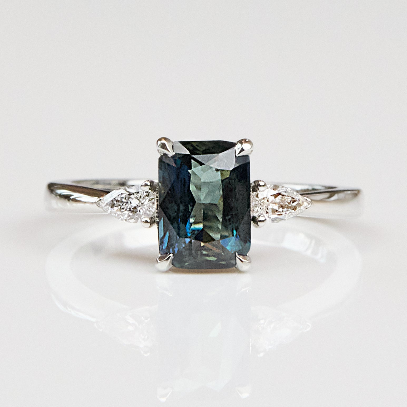 Platinum Emerald Shape Teal Sapphire Engagement Ring