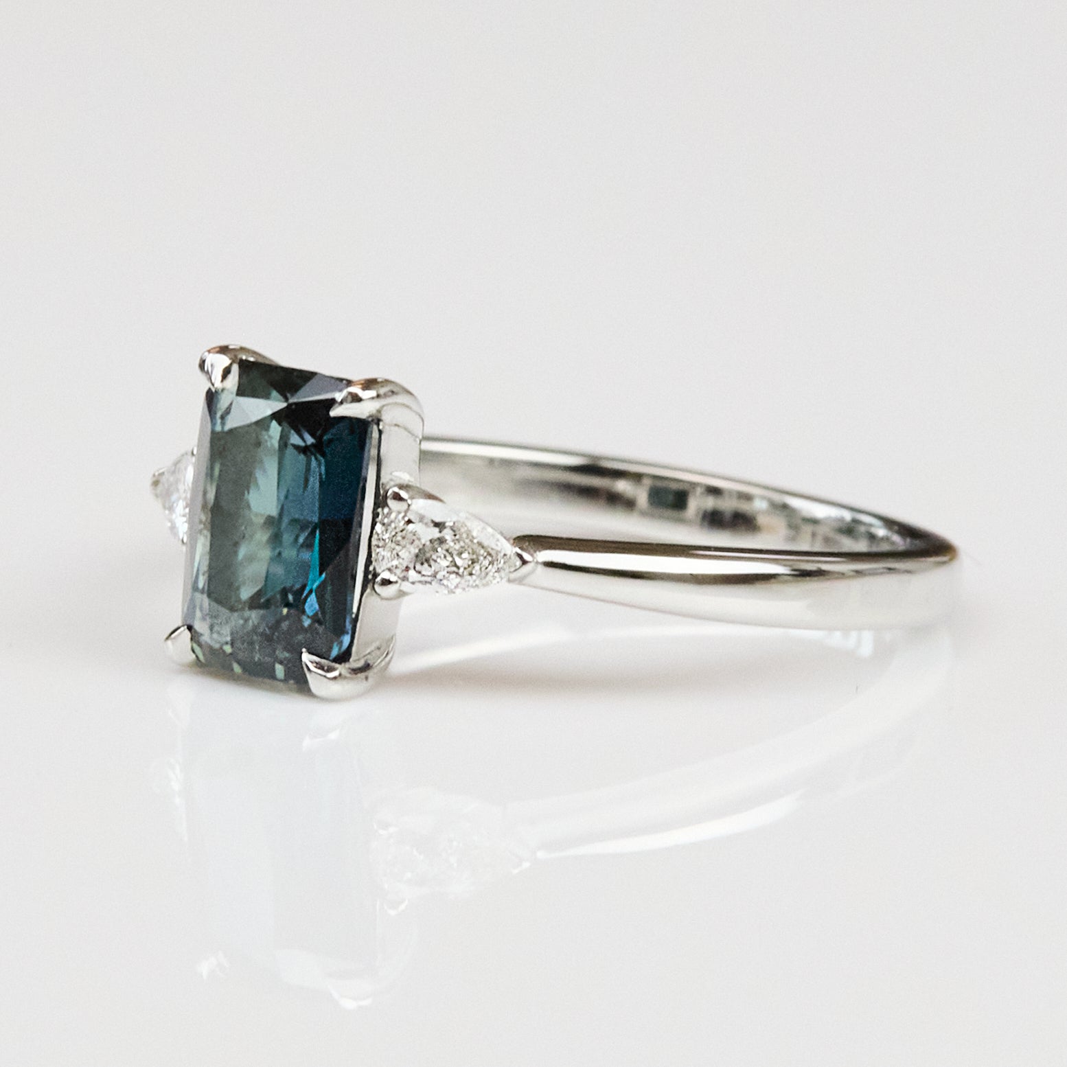 Platinum Emerald Shape Teal Sapphire Engagement Ring