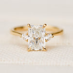 Radiant cut diamond engagement ring in yellow gold
