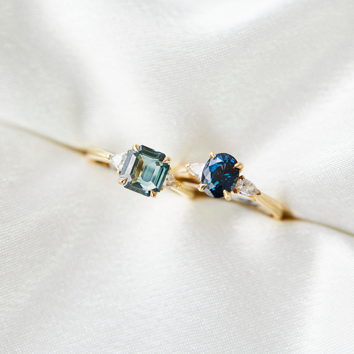 18ct yellow gold oval trilogy ​teal sapphire rings