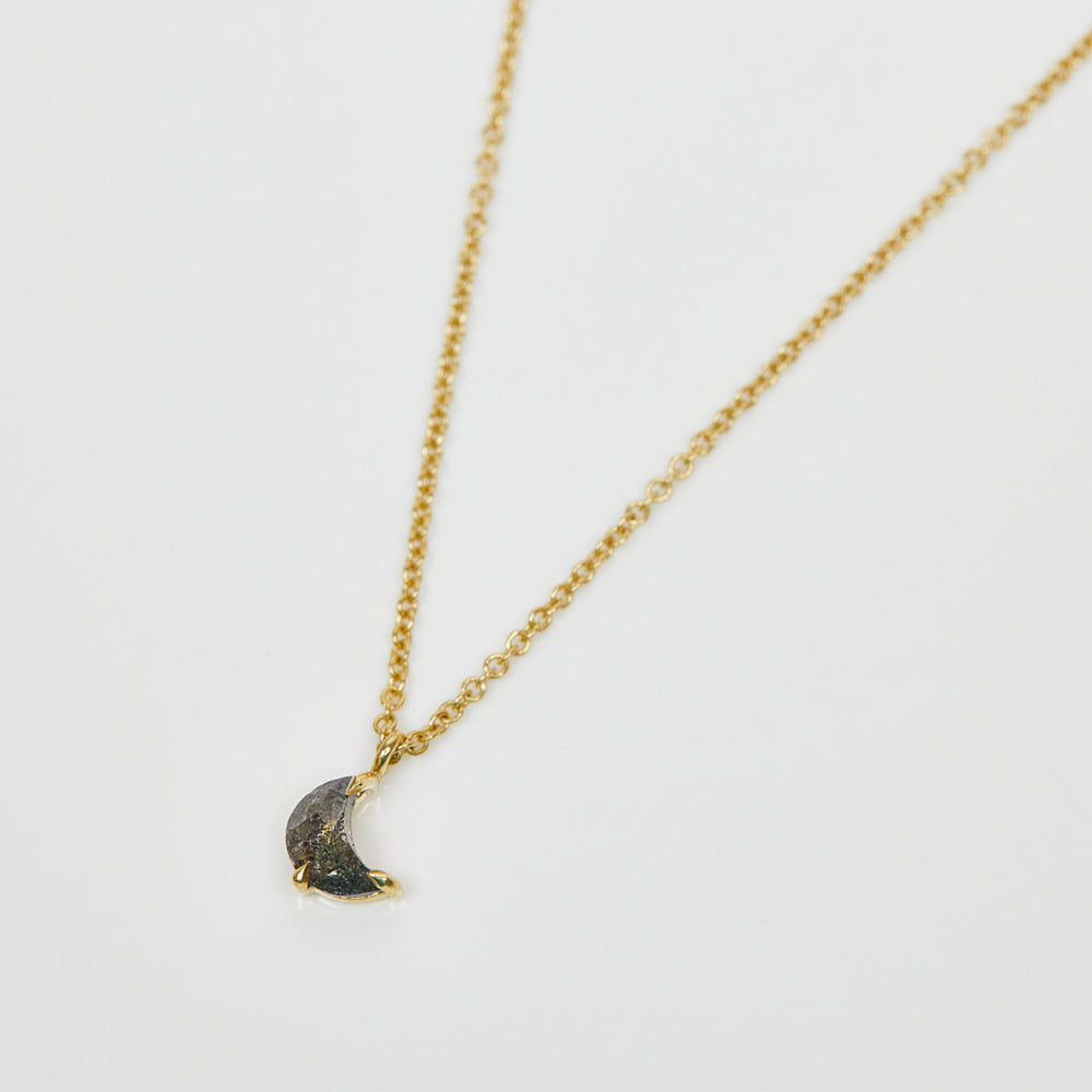 Crescent moon salt and pepper diamond necklace in 18ct yellow gold.