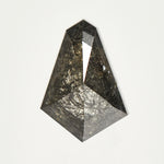 Handcrafted elongated tapered baguette rose-cut dark ethically sourced salt and pepper diamond.